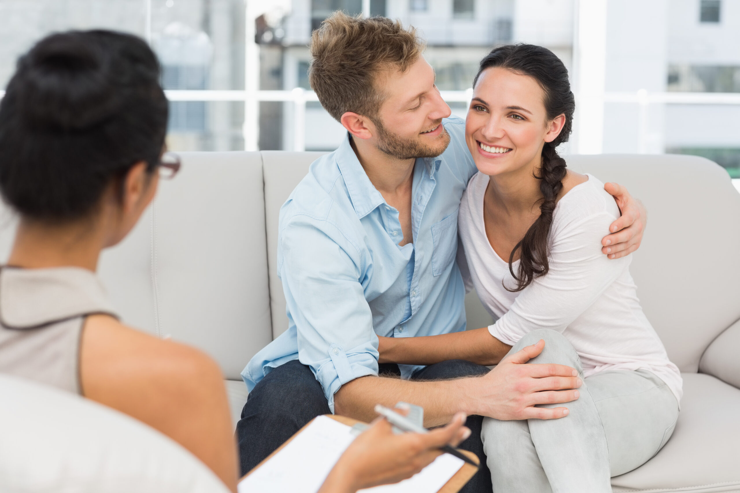 happy-couple-reconciling-at-therapy-session-in-the-2026-04-14-00-08-30-utc