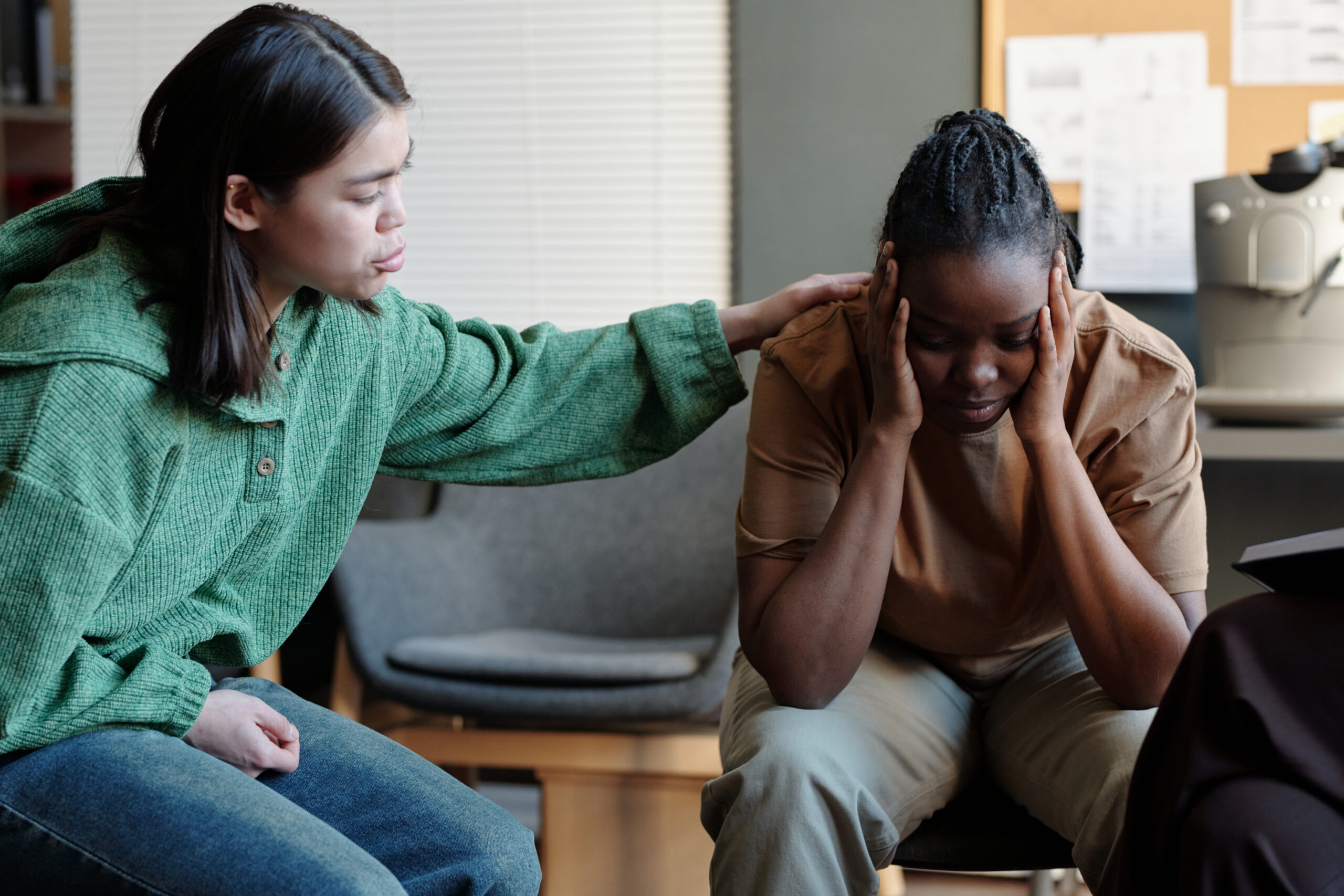 Comforting desperate woman at session